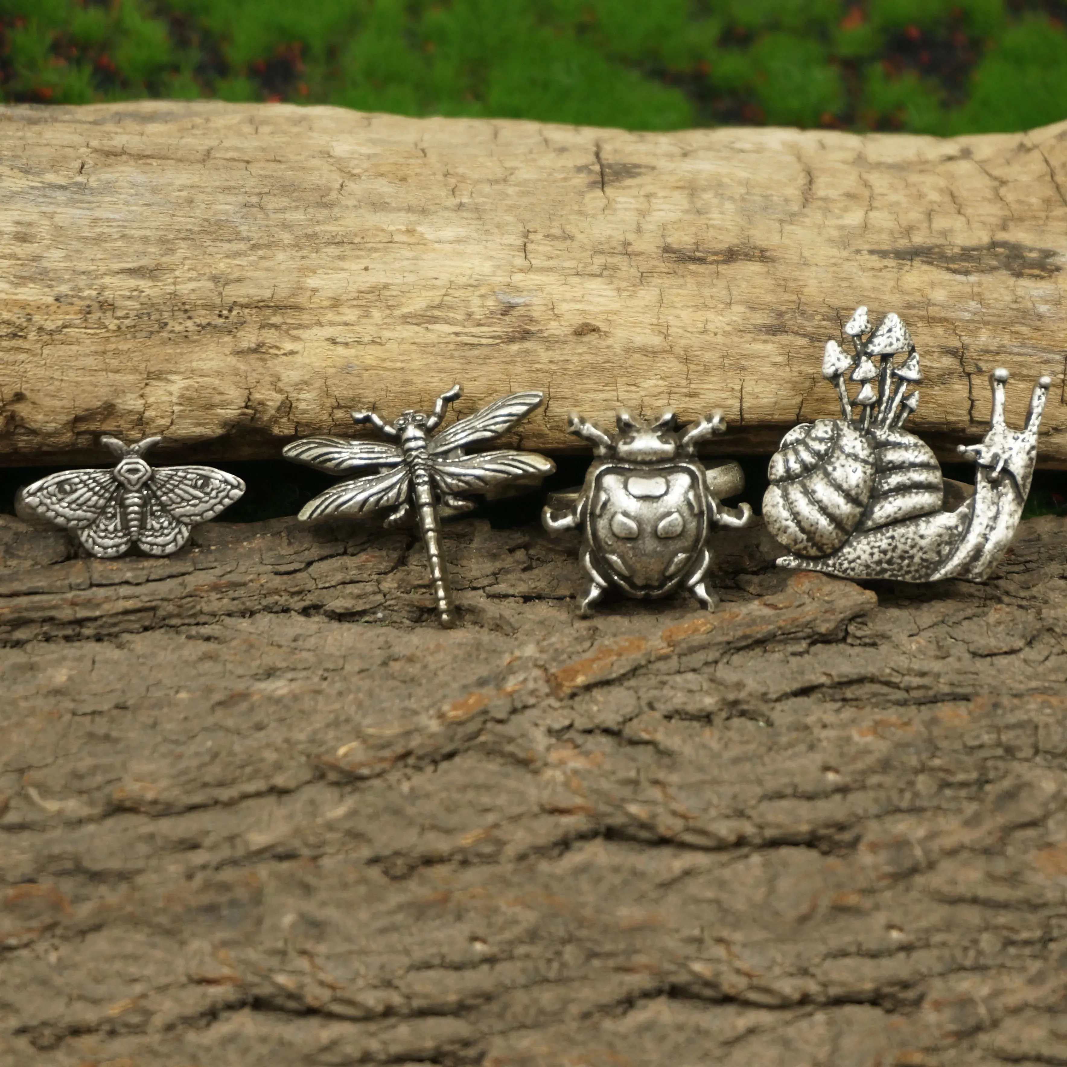 A set of 4 Cute Critter Rings Dragonfly Mushroom Snail Ladybug Moth Rings