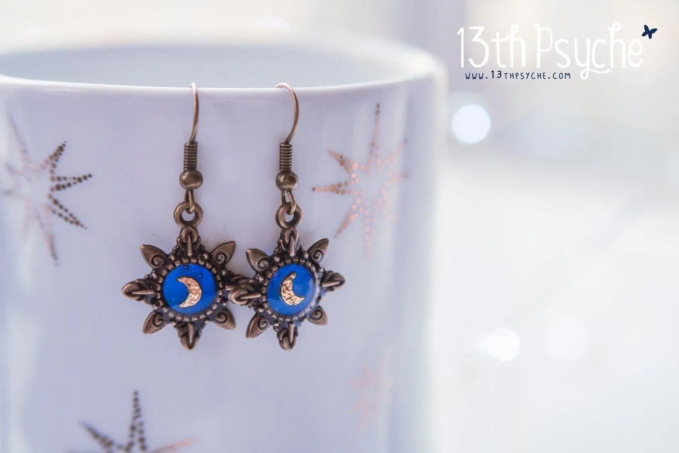 Blue star gold moon resin dangle earrings