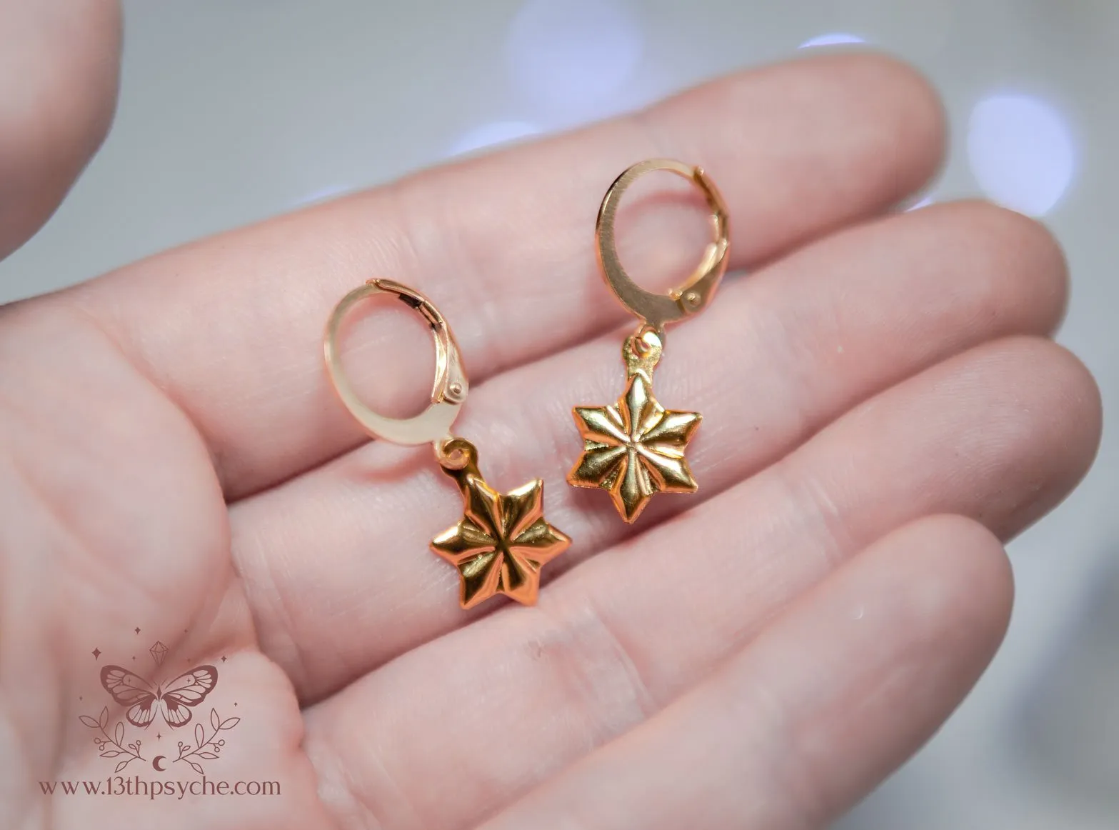 Stainless steel snowflake gold huggie hoop earrings